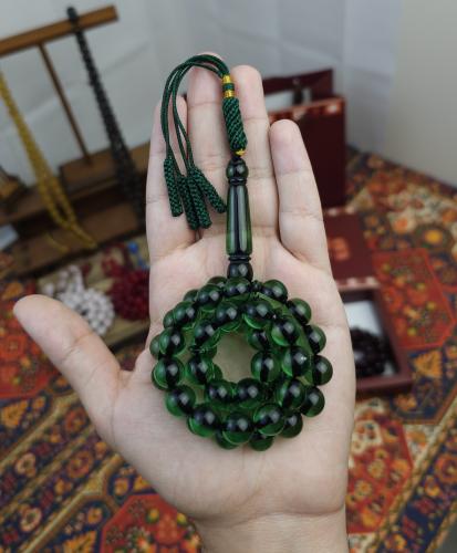 سبحة بكلايت اخضر شفاف خيط اسود كركوشة