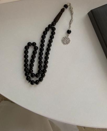 A prayer bead with a light