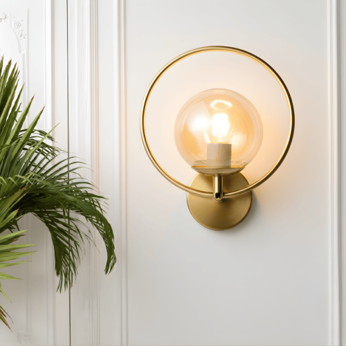 ابليك جداري مودرن ذهبي شكل دائري مع كرة زجاجية