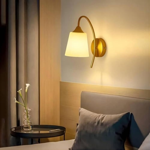 ابليك جداري مودرن ذهبي زجاج مثلج