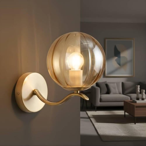 ابليك جداري مودرن ذهبي مع كرة زجاجية بلون عسلي