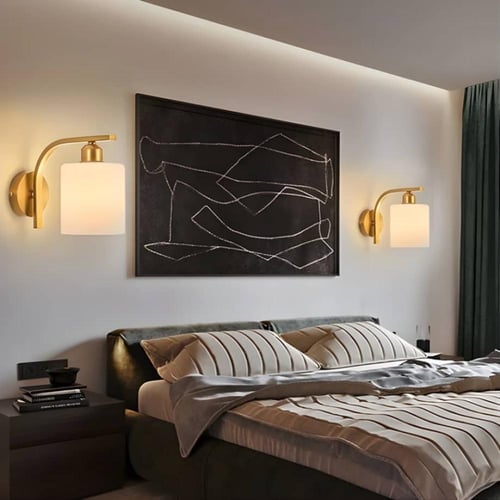 ابليك جداري مودرن ذهبي وغطاء زجاجي أبيض