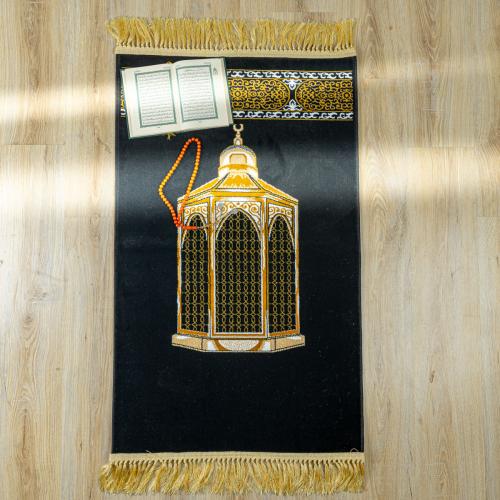 سجادة صلاة بتصميم و نقوش إسلامية لون أسود و ذهبي م...