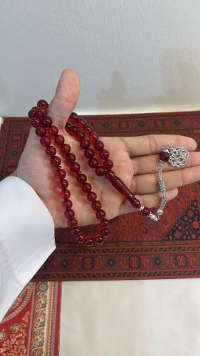 بكلايت عنابي شفاف معدن