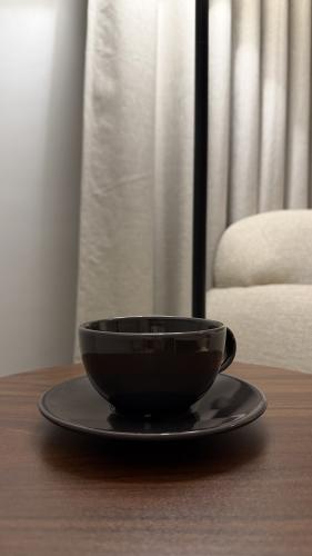 Cup with plate upon request