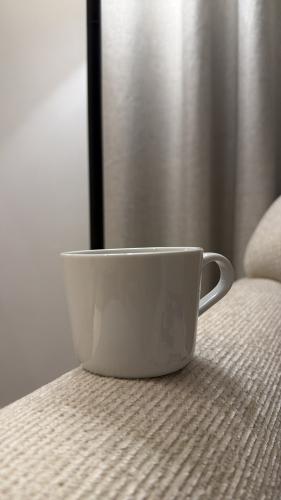White cup upon request