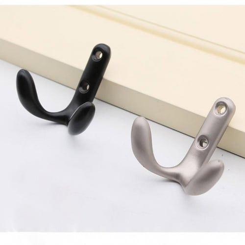 علاّقات جدارية معدنية