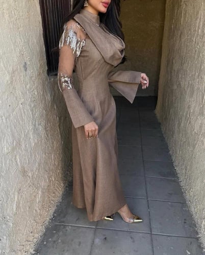 فستان بني بأكمام شفافة مطرزة بالترتر