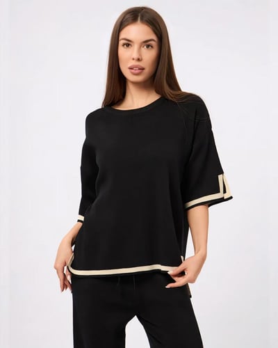 طقم نسائي كاجوال أسود مع حواف بيج أنيقة