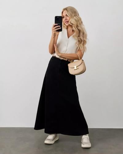 تنورة نسائية طويلة دنيم بخصر مرتفع وقصة واسعة