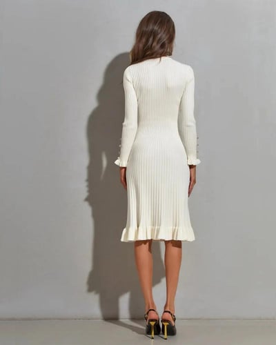 فستان ميدي بيج بأكمام طويلة وأزرار لؤلؤية