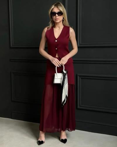 طقم نسائي قطعتين سترة بدون أكمام وتنورة طويلة مطوي...