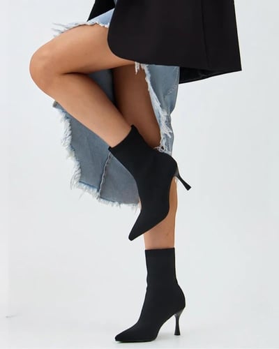 حذاء بوت نسائي بكعب عالي وتصميم جورب مرن – أسود كل...