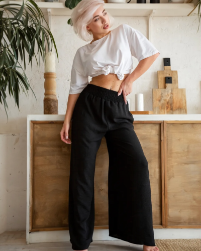 بنطال نسائي واسع بلون أسود بخصر مطاطي