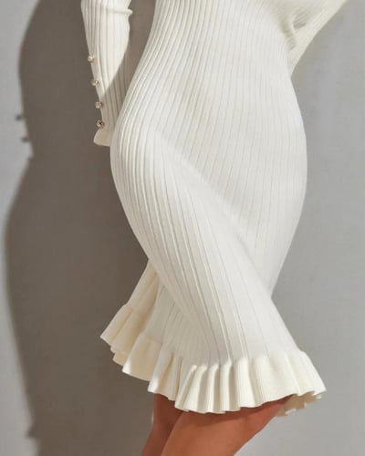 فستان ميدي بيج بأكمام طويلة وأزرار لؤلؤية