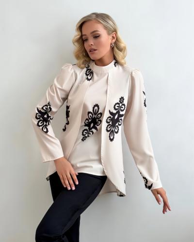 قميص نسائي بيج مزينة بتطريز أسود أنيق وبأكمام طويل...