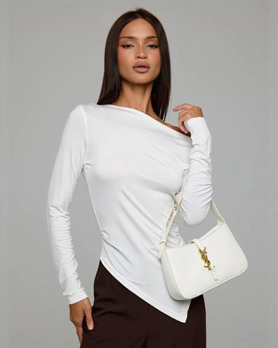 بلوزة نسائية بأكمام طويلة تصميم كتف ساقط بلون أبيض...