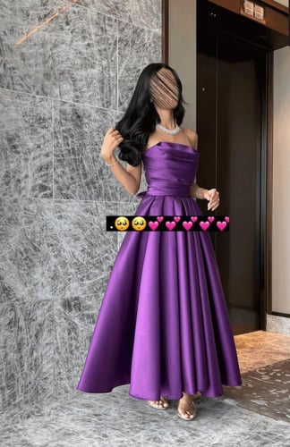 فستان سهرة ليلكي ميكادو سادة بقصة ميدي كلوش واسعة