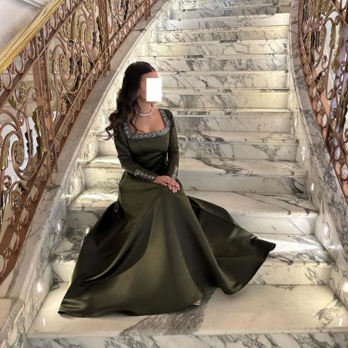 فستان سهرة ميكادو زيتوني مطرز بالفصوص