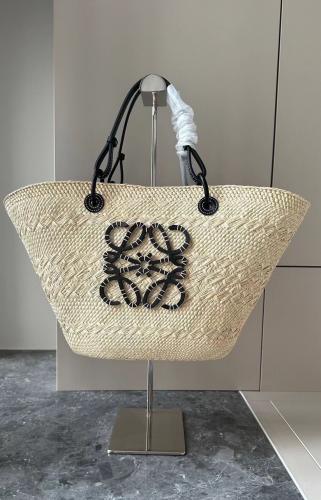 Medium Anagram Basket bag in iraca palm and calfsk...