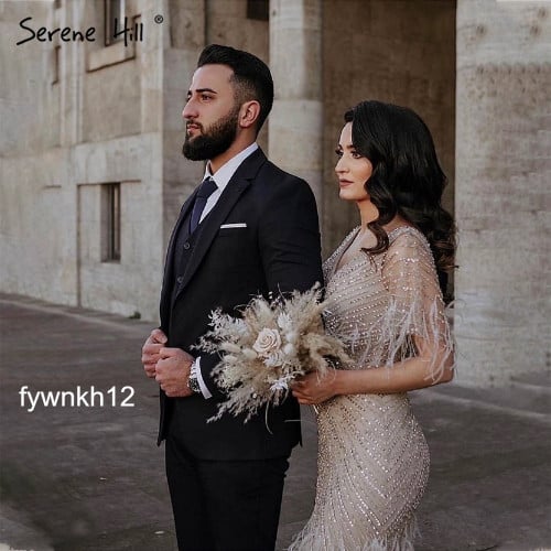 فستان سهرة فاخر من Serene Hill مزين بالريش