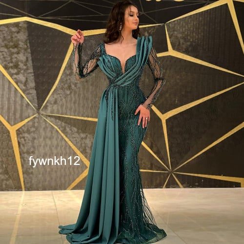 فستان سهرة بحورية بحر زمردي