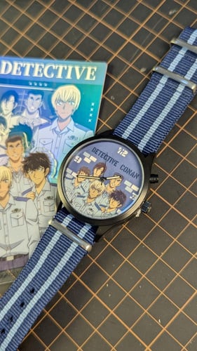 ساعة شخصيات اكادمية الشرطة من المحقق كونان.