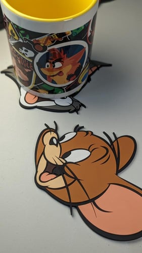 قاعدة أكواب ( كوستر ) توم اند جيري.ي.