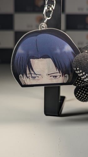 ميدالية صورة متحركة ليفاي من هجوم العمالقة.