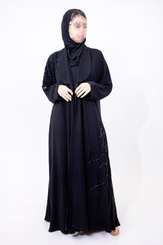 عباية نص كلوش ملكي مع شك يدوي اسود مميّز على الكتف...