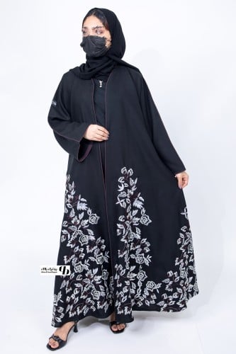 عباية نص كلوش كتان بقيطان عنابي وتطريز ابيض اسفل و...
