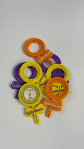 قطعة لتثبيت العملة المعدنية بشكل مصاصة (25) حبة