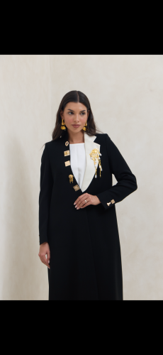 Black blazer with a single collar in cream color w...