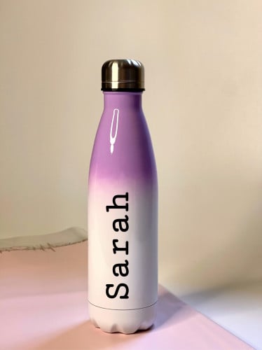 مطارة ماء لون بنفسجي