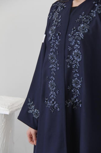 عباية بقماش سراميك كحلي مع شك انيق