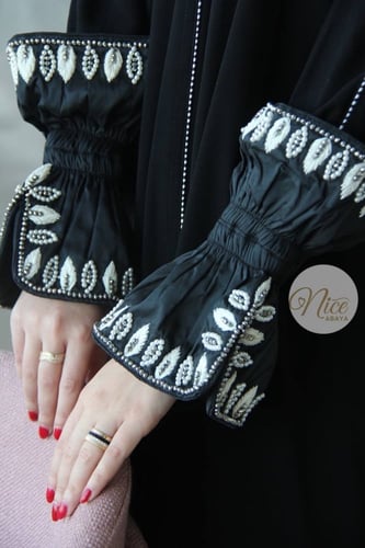 عبايه قماش كوري مع اكمام شانتون