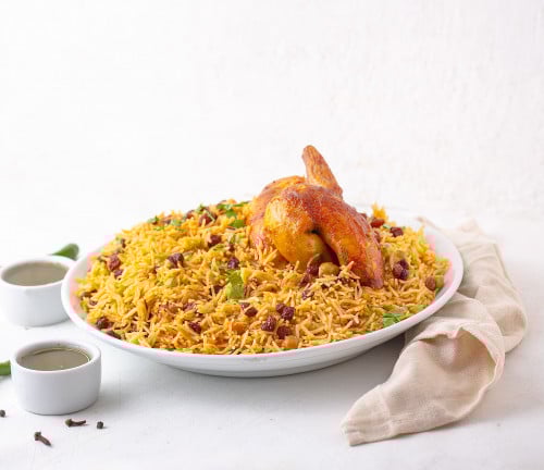 نصف دجاج شواية مع الرز