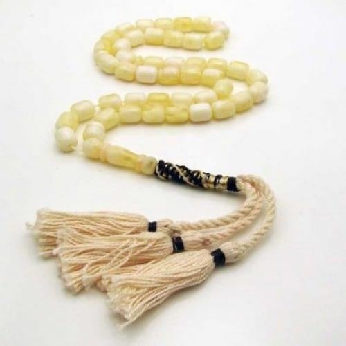 سبحة تراب كهرمان زيتونة بيج اللون