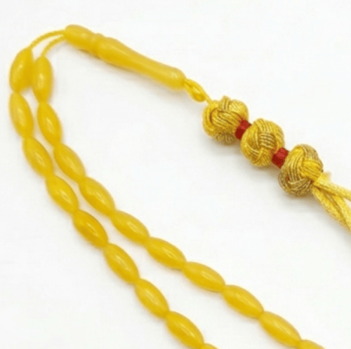 سبحة تراب كهرمان دائرية اصفر اللون