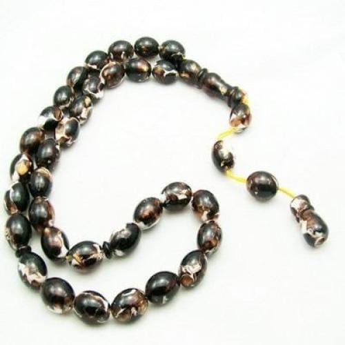 سبحة كهرمان رخامية اللون اسطوانية