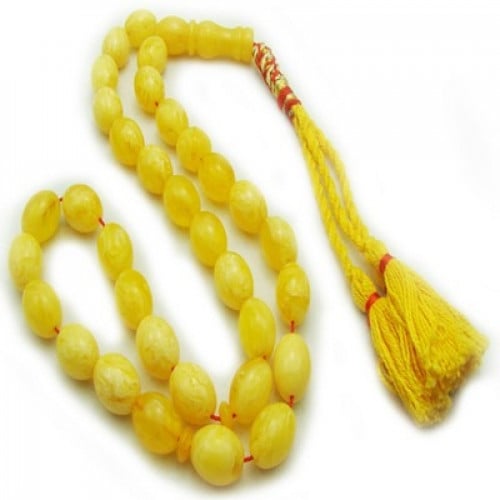 مسبحة تراب كهرمان اسطوانية اصفر اللون