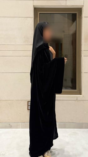 Black Velvet Bisht with extra-wide black sleeves.