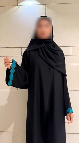 A line with Turquoise Tricot and Wide Sleeves