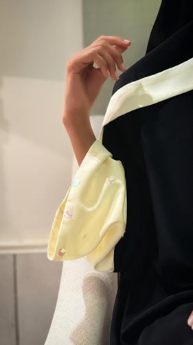 Black A-line abaya with glistering butter yellow s...