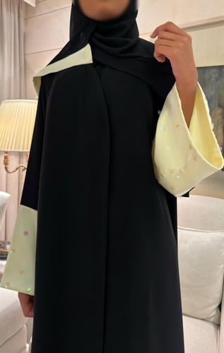 Black A-line abaya with glistering butter yellow s...