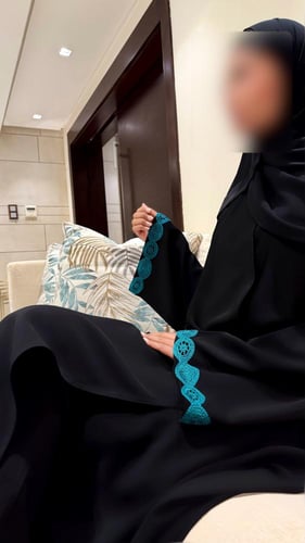 A line with Turquoise Tricot and Wide Sleeves