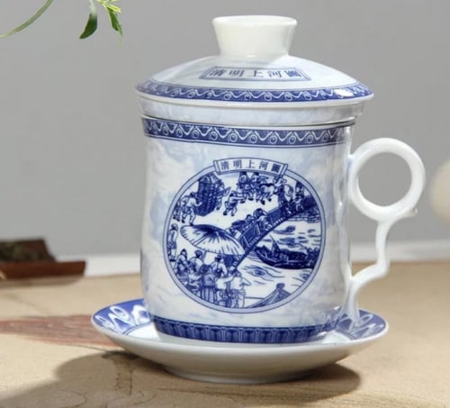 كوب مكون من 4 قطع مزخرف باللون الازرق رسمت بيت