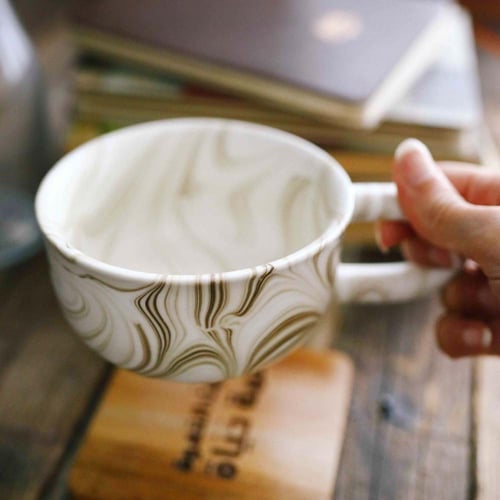 كوب قهوة لون ماربل