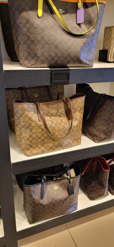 شنطة كوتش توتي كبيره لون كاكي