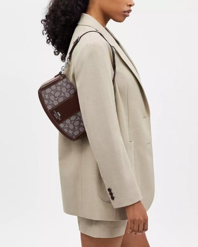 شنطة كوتش كتف اندريا جلد الجاكار